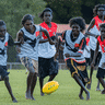 Football is a way if life in Maningrida, but the remote community is yet to produce an AFL player.