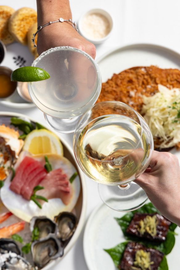 Margarita and wine over a feed.