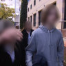 The teenager leaving Perth Children’s Court with his family in July.