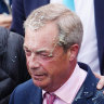 CLACTON-ON-SEA, ENGLAND - JUNE 4:  Reform UK party leader Nigel Farage reacts after a woman threw a drink over him, as he launches his election candidacy at Clacton Pier on June 4, 2024 in Clacton-on-Sea, England. The launch follows yesterday’s announcement that Nigel Farage will stand as an MP in Clacton at the 4 July general election and takes over from Richard Tice as leader of Reform UK. The Conservative-held seat in Essex was the first to elect a UKIP MP in 2014, a party that Farage founded. (Photo by Carl Court/Getty Images)