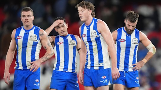 Cam Zurhaar, Zac Fisher, Nick Larkey and Luke McDonald look dejected after their side coughed up a massive lead to be overrun by Collingwood.