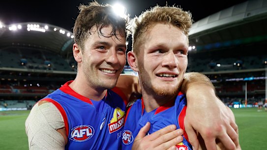 Josh Dunkley and Adam Treloar celebrate their preliminary final win over Port Adelaide.