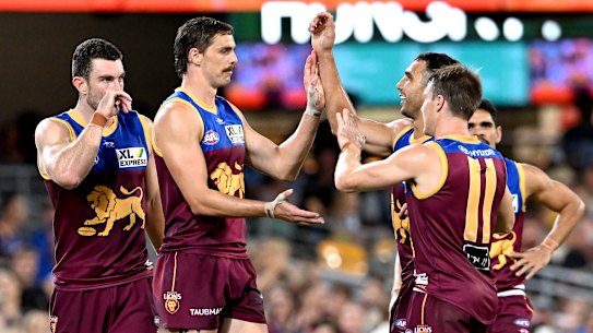 BRISBANE, AUSTRALIA - APRIL 02: Joe Daniher of the Lions celebrates after kicking a goal during the round three AFL match between the Brisbane Lions and the North Melbourne Kangaroos at The Gabba on April 02, 2022 in Brisbane, Australia. (Photo by Bradley Kanaris/Getty Images)