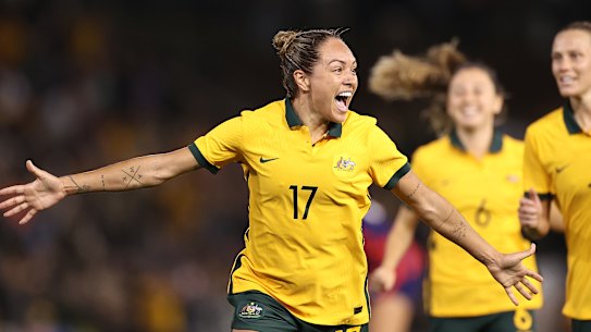 Kyah Simon celebrates after scoring against the US in a friendly in 2021.