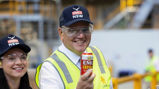 Scott Morrison comfortable standing out in high-vis gear on the campaign trail.