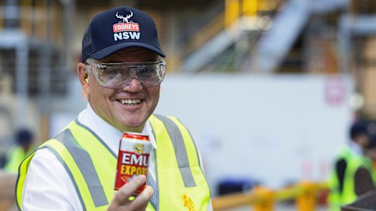 Then Prime Minister Scott Morrison campaigning in the seat of Reid in November 2021. Reid received 20 times more in grant funding than the adjacent seat of Grayndler, held by Labor leader Anthony Albanese.