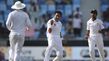 Pakistan's Mohammad Abbas (centre) celebrates after taking the wicket of Aaron Finch.