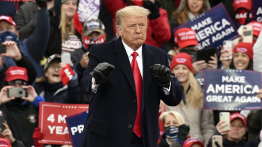 Donald Trump campaigning in Michigan  on Saturday AEDT.