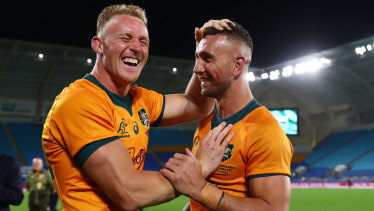 Reece Hodge and Quade Cooper after the Wallabies’ victory over the Springboks on Saturday.