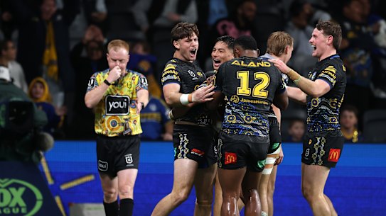 The Eels celebrate a try against North Queensland.