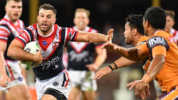 Brush-off: Roosters fullback James Tedesco turns on the afterburners against Brisbane.