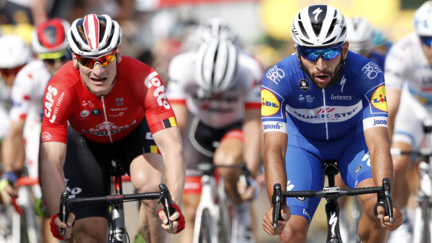 Colombia's Fernando Gaviria (right) crosses the finish line to win the fourth stage of the Tour de France.