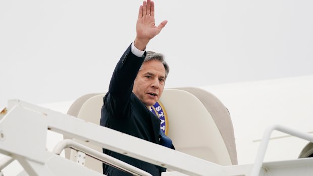 US Secretary of State Antony Blinken waves as he departs Andrews Air Force Base. 