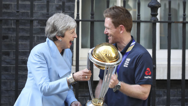 England captain Eoin Morgan shares a laugh with British PM Theresa May.