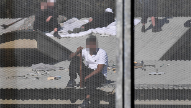Detainees on the roof of the Frank Baxter Juvenile Justice Centre during the stand-off. 