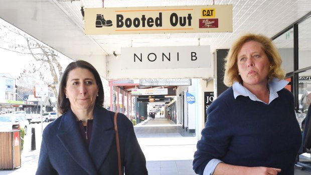 Premier Gladys Berejiklian and her Liberal candidate Julia Ham walk the streets of Wagga Wagga on Friday. 