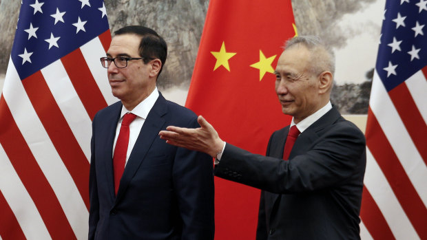 Chinese Vice-Premier Liu He shows the way to US Treasury Secretary Steven Mnuchin during their meeting at the Diaoyutai State Guesthouse in Beijing in May.