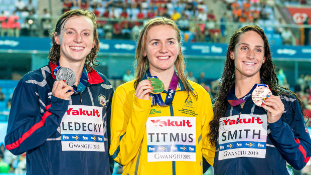 Ariarne Titmus, centre, after winning gold in the 400m freestyle at the world championships in South Korea.