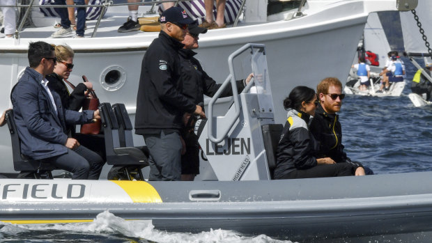 The Duke and Duchess of Sussex, Harry and Meghan, sail on Sydney Harbour on the first day of the Invictus Games in Sydney.