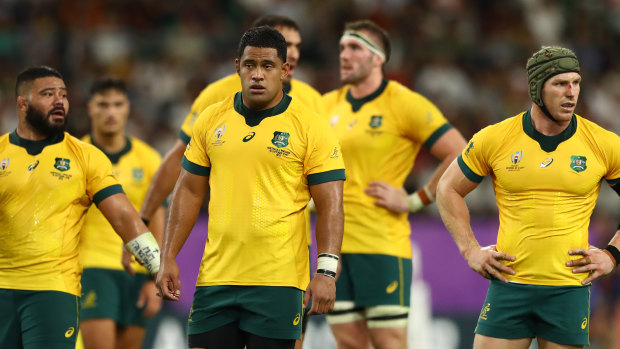 Wallabies players react to their World Cup quarter-final loss to England. 