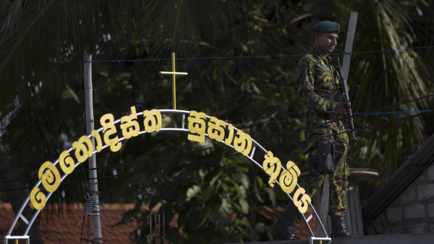 A Sri Lankan special task force officer stands guard in Negombo in the aftermath of the Easter Sunday attacks.