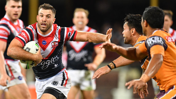 Brush-off: Roosters fullback James Tedesco turns on the afterburners against Brisbane.