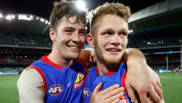 Josh Dunkley and Adam Treloar celebrate their preliminary final win over Port Adelaide.