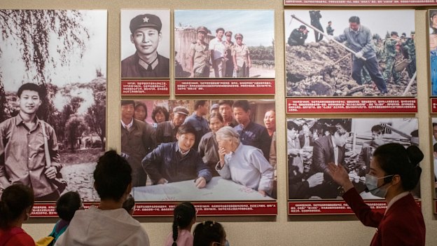 Children learn the life story of their leader, Xi Jinping, at the Museum of the Chinese Communist Party in Beijing in October.