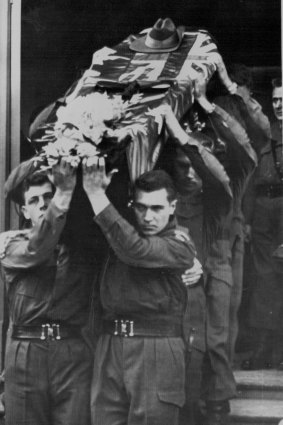 Pallbearers form the 3rd Battalion, R.A.R., carry the coffin of National Serviceman Private Errol Wayne Noack from Bethlehem Lutheran Church in Adelaide on June 2, 1960.