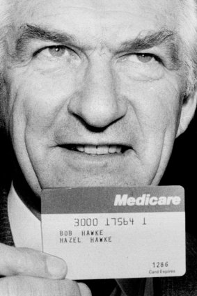 Bob Hawke in October 1983 with one of the first Medicare cards.