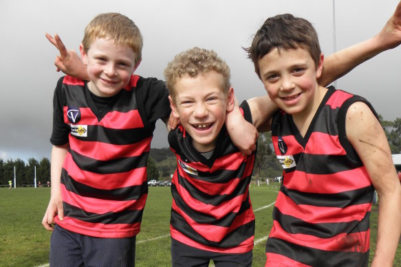 Josh Rentsch (middle) with his cousins Edward and Duncan after an under-12s game when they were eight.