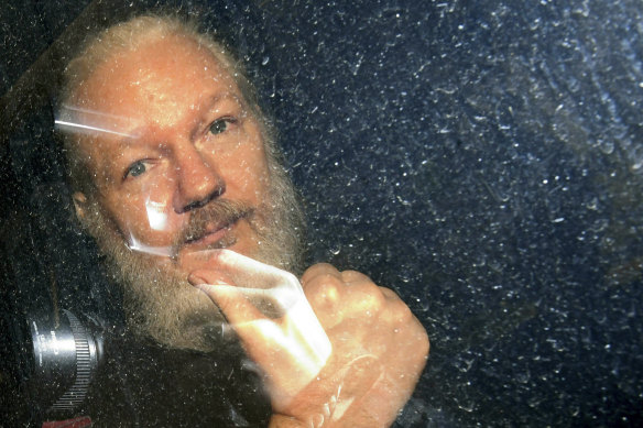 Julian Assange is driven from the Ecuadorian embassy in London after his arrest in April.