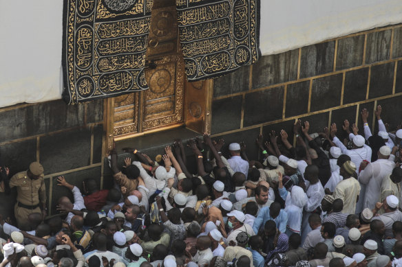 Muslim pilgrims pray at the Kaaba, in the Mecca, Saudi Arabia, where hundreds of people have previously been killed in a deadly stampede.