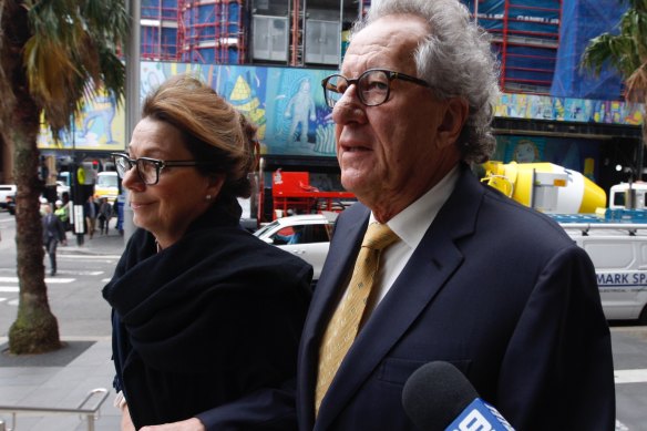 Actor Geoffrey Rush arrives at court on Tuesday with his wife Jane Menelaus.