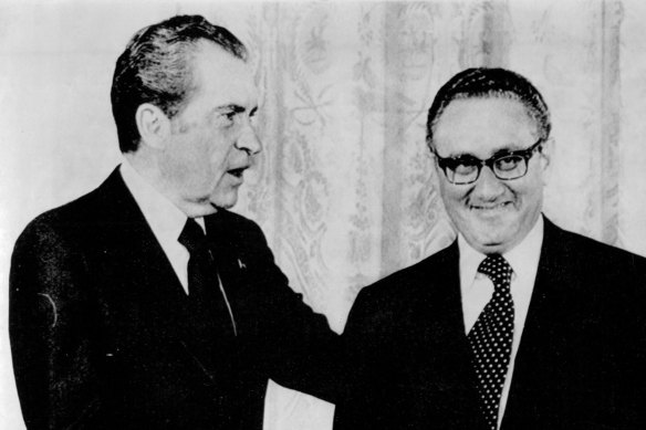 President Nixon congratulates Henry A. Kissinger after he as sworn in as secretary of state in 1973.