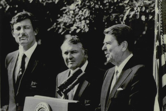 To the victors go the spoils: Australia II skipper John Bertrand (left) and owner Alan Bond (middle) are celebrated by President Ronald Reagan after their famous victory at Newport on September 26, 1983.