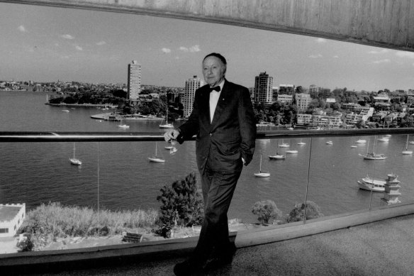 Harry Seidler pictured in 1991 on the balcony of his Milsons Point office-penthouse with Blues Point  Tower at left in background. 