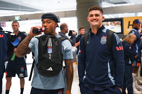 Penrith and NSW teammates Brian To’o and Nathan Cleary after landing in Sydney.