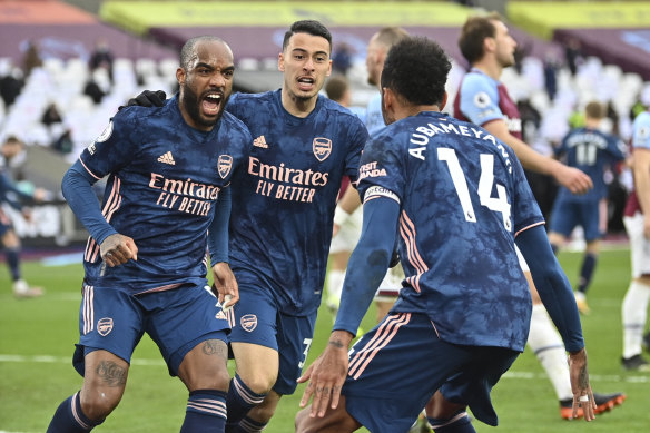 Arsenal’s Alexandre Lacazette celebrates after scoring the equaliser against West Ham at the London Stadium on Sunday.