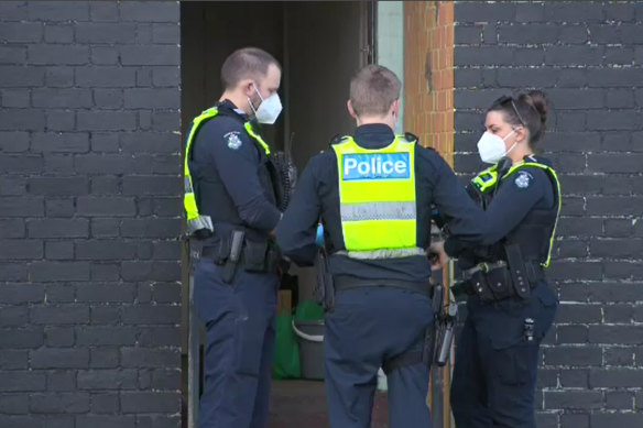 Police at a property on Boundary Road in North Melbourne on Thursday afternoon.