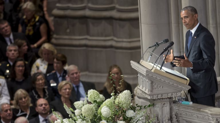 Former US President Barack Obama speaks during a memorial service for late Senator John McCain at Washington National Cathedral in Washington, D.C.,  on Saturday.