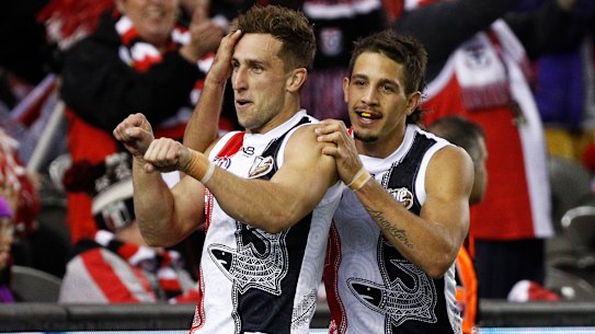 Big hit: St Kilda's Luke Dunstan (left) celebrates a goal against Carlton.