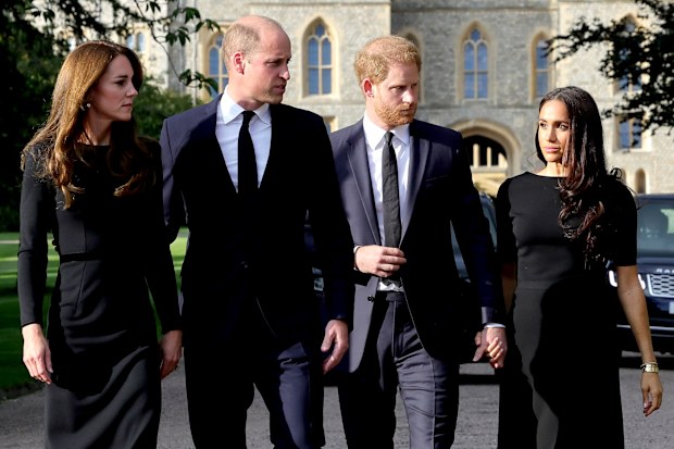 Catherine, Princess of Wales, Prince William, Prince of Wales, Prince Harry, Duke of Sussex, and Meghan, Duchess of Sussex on the long Walk at Windsor Castle arrive to view flowers and tributes to HM Queen Elizabeth on September 10, 2022 in Windsor, England. Crowds have gathered and tributes left at the gates of Windsor Castle to Queen Elizabeth II, who died at Balmoral Castle on 8 September, 2022. (Photo by Chris Jackson - WPA Pool/Getty Images)