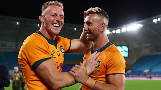 Reece Hodge and Quade Cooper after the Wallabies’ victory over the Springboks on Saturday.