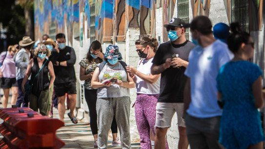 A COVID-19 testing queue at Collingwood on Tuesday. 