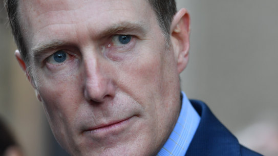 Claiming he is the winner: Christian Porter outside the Federal Court in Sydney on Monday.