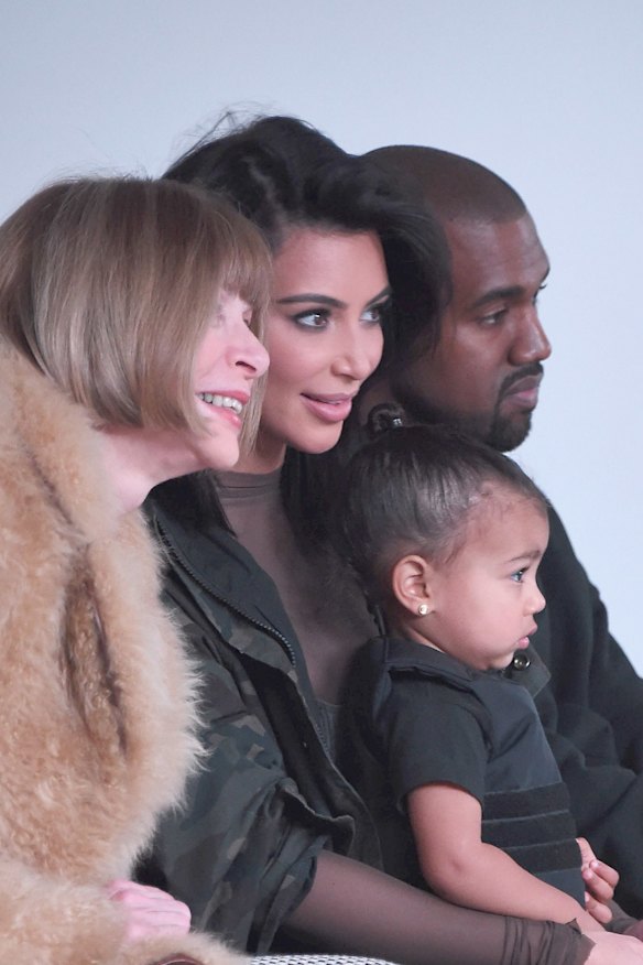 Anna Wintour with Kim Kardashian, Kanye West and their daughter North West at Fashion Week (2015). 