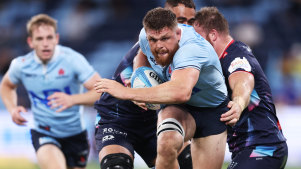 SYDNEY, AUSTRALIA - MARCH 29:  Lachlan Swinton of the Waratahs is tackled during the round six Super Rugby Pacific match between NSW Waratahs and Melbourne Rebels at Allianz Stadium, on March 29, 2024, in Sydney, Australia. (Photo by Matt King/Getty Images)
