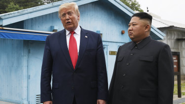 President Donald Trump meets North Korean leader Kim Jong-un at the border village of Panmunjom in the Demilitarised Zone, South Korea on Sunday.