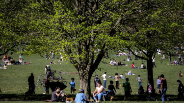People leave home for the outdoors as the temperature warmed up, even as the stay-at-home order remained in effect with Governor Andrew Cuomo warning that any change in behavior could reignite the spread of coronavirus, in Brooklyn's Prospect Park in New York. 